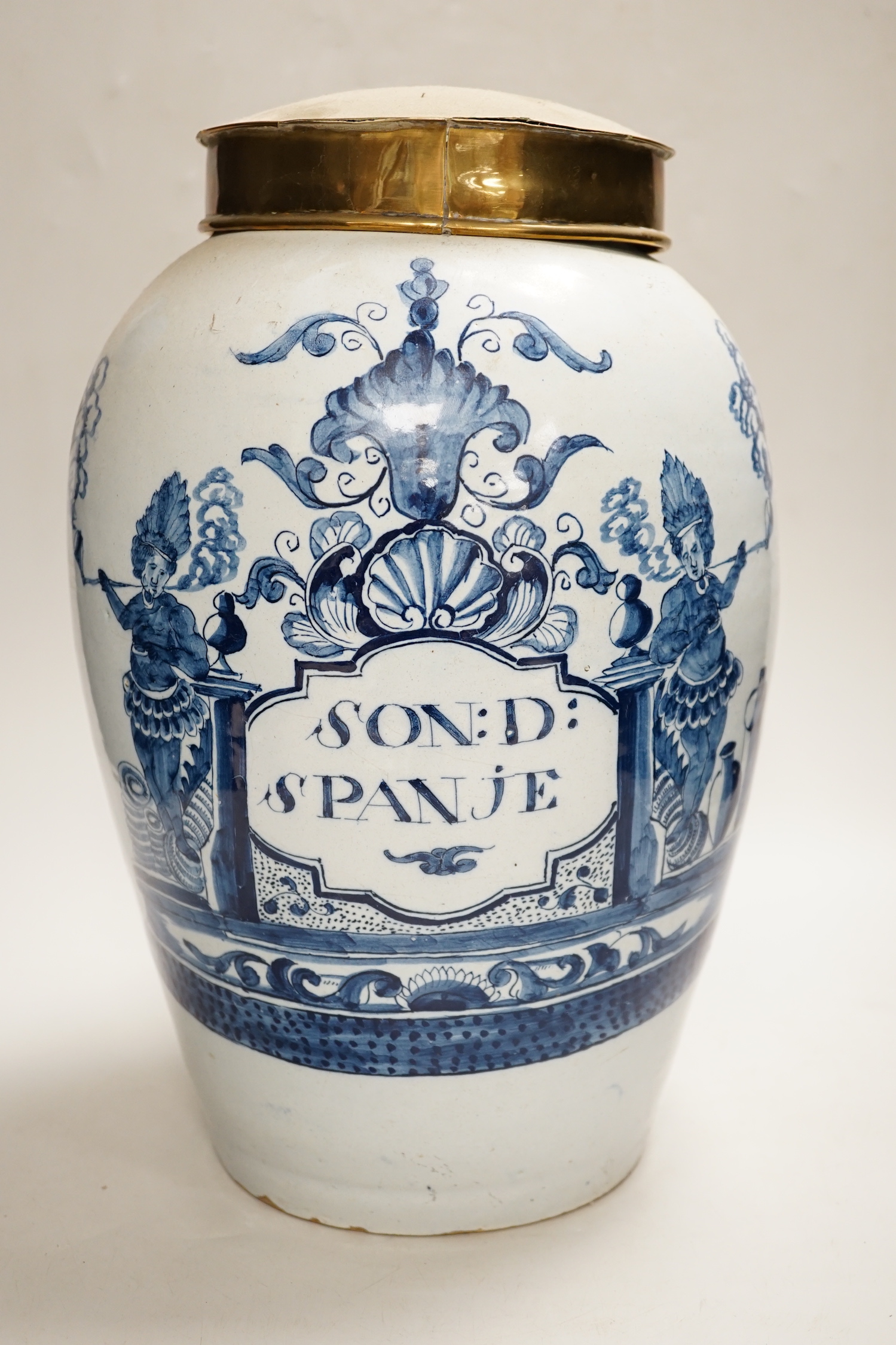 A mid 18th century Delft tobacco jar and brass cover, 36cm